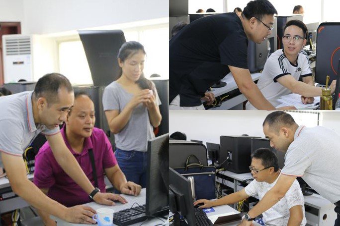 图3专家们亲自辅导提问的学员 图3专家们亲自辅导提问的学员